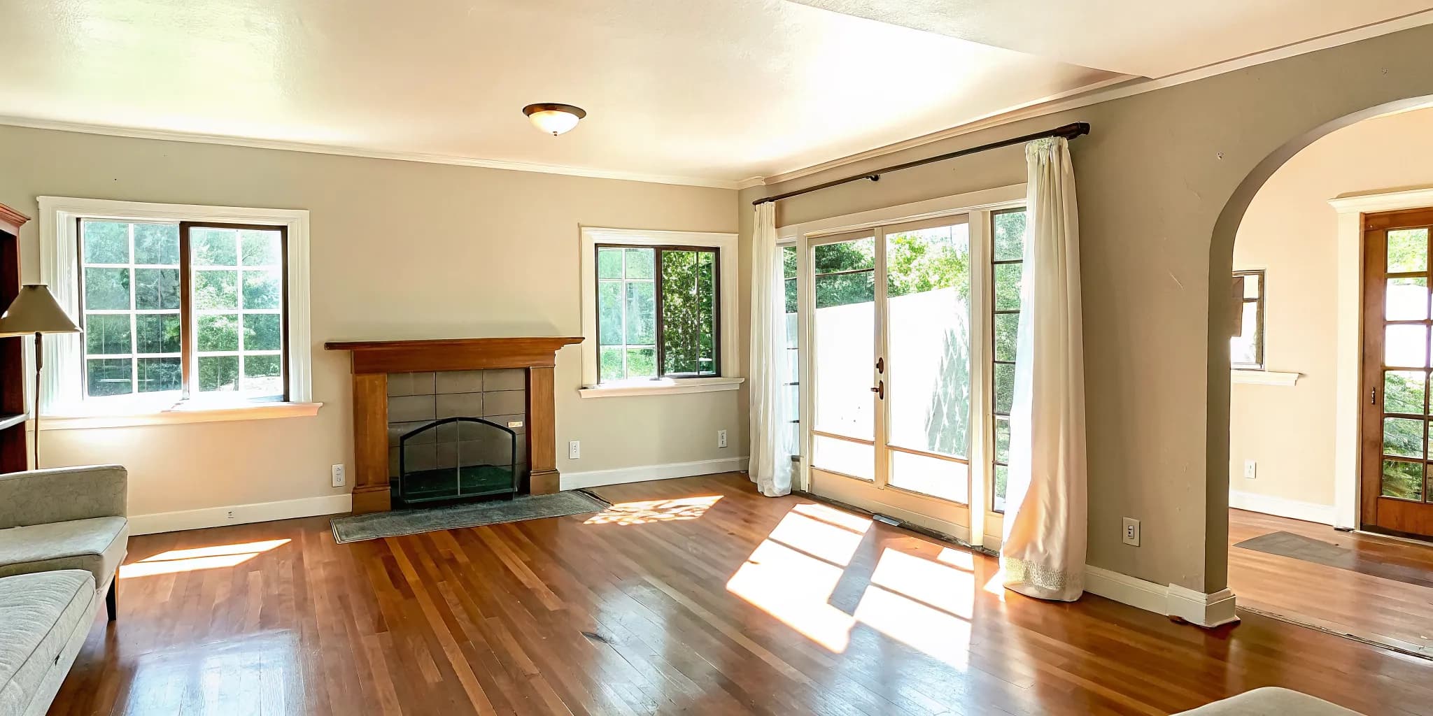 Bright clean living room with sunlight streaming through windows ready for new homeowners in Moore Oklahoma